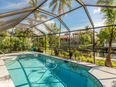 Three Bedroom Canal View Vacation Home with Private Pool